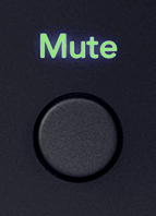 Cutout of the 18i20's Mute button in its on state (green).