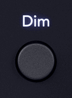 Cutout of the 18i20's Dim button in its off state (white).