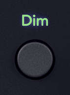 Cutout of the 18i20's Dim button in its on state (green).
