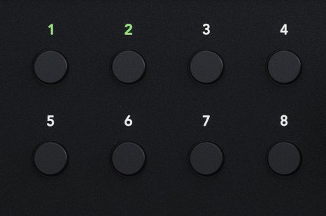 A cutout of the Scarlett 18i20's input select buttons showing two linked channels (lit green).